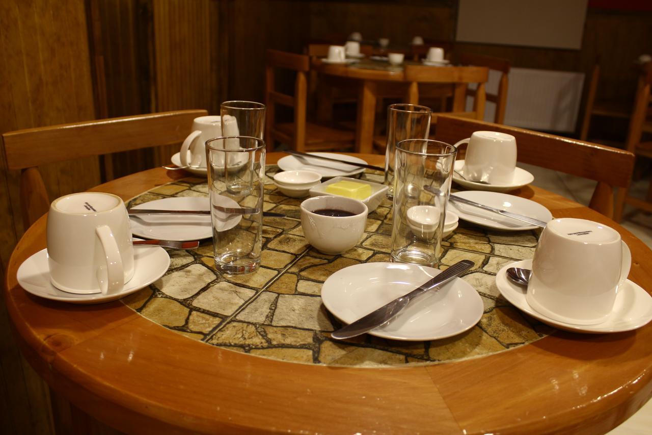 Hostal America En Puerto Natales Kültér fotó